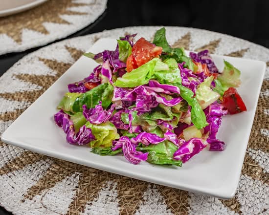 Lebanese salad with tomato, cucumber and herbs