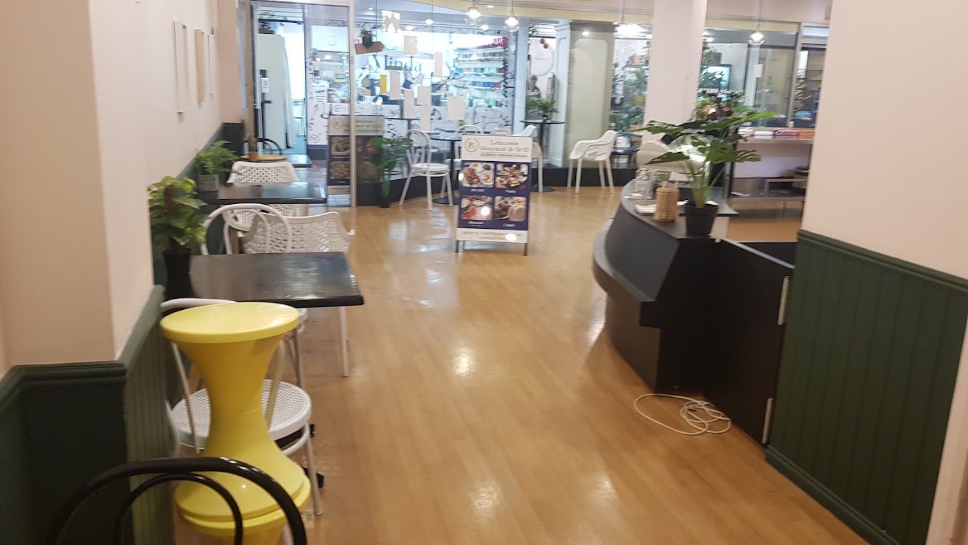 Tables and chairs in the indoor dining area