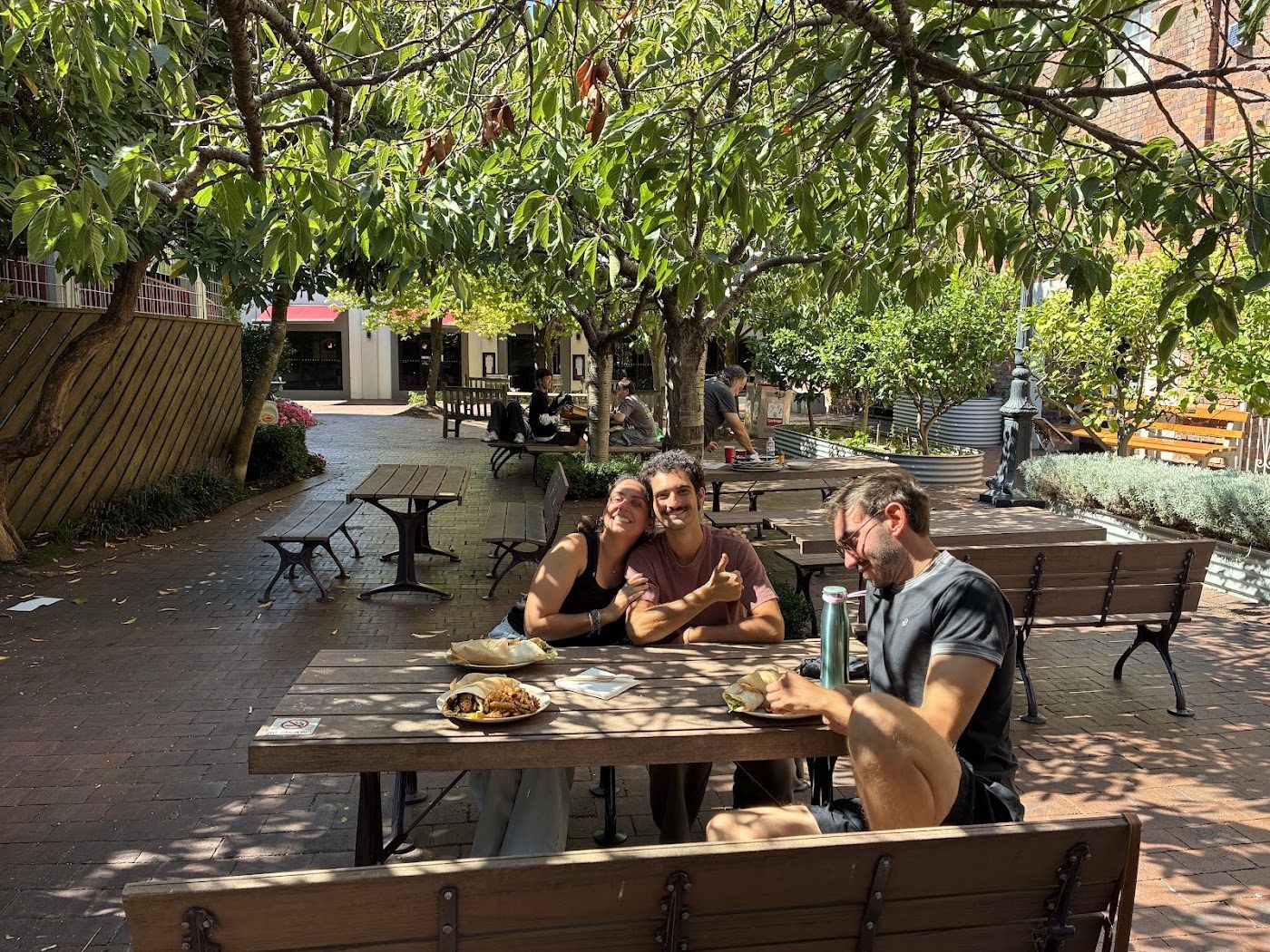 Guests eating at the outdoor tables